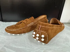 Women's brown suede tassel loafers, side-pair view