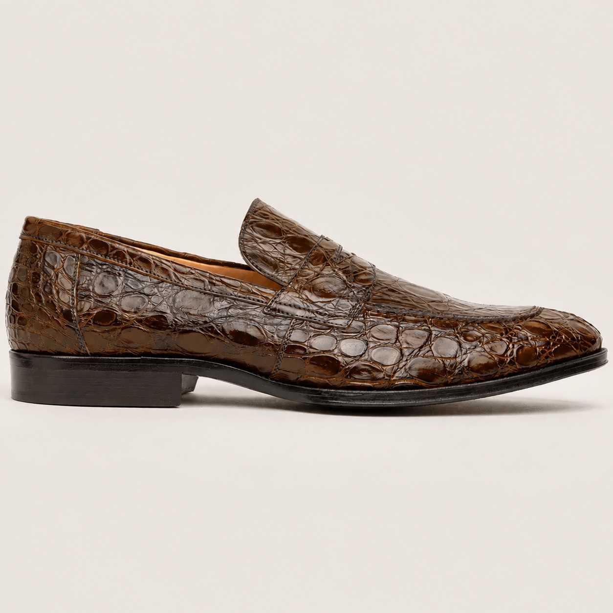 Cognac crocodile penny loafer side profile