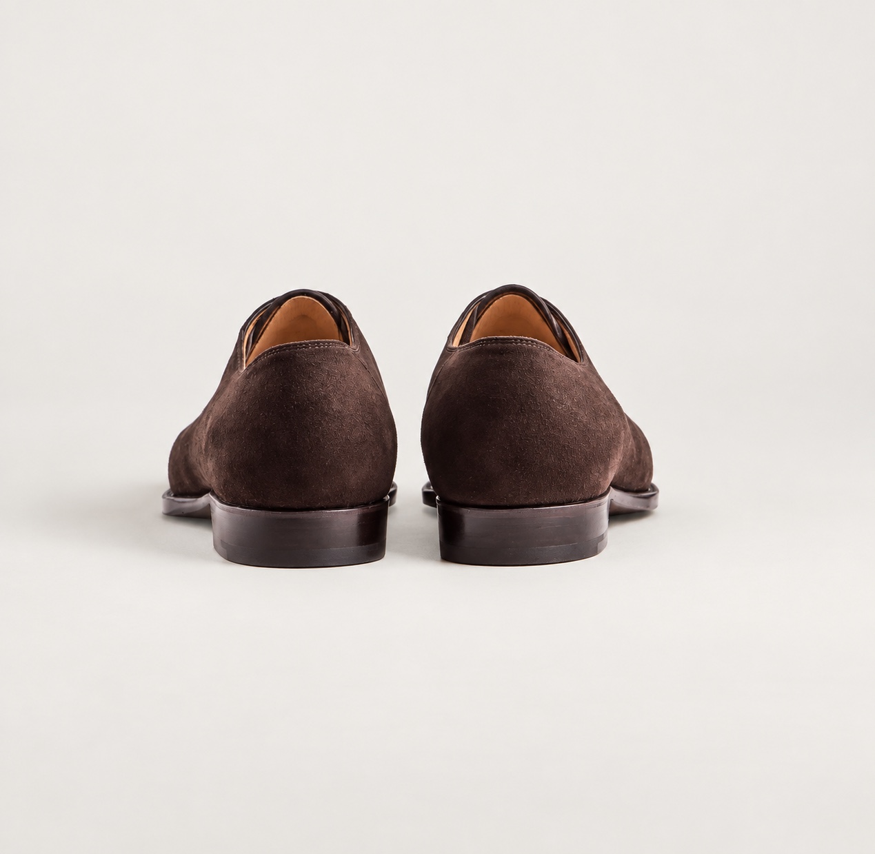 Rear view of the dark brown shoes and low heels