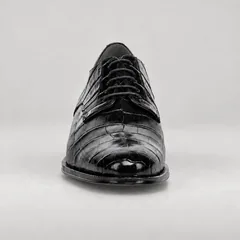 Front view of a polished black alligator lace-up shoe with a gently tapered toe