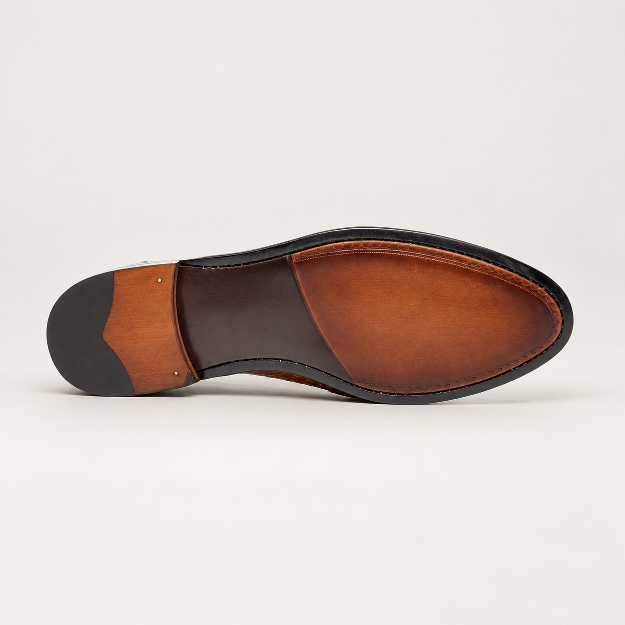 Brown patina outsole preview with identifying stamps removed