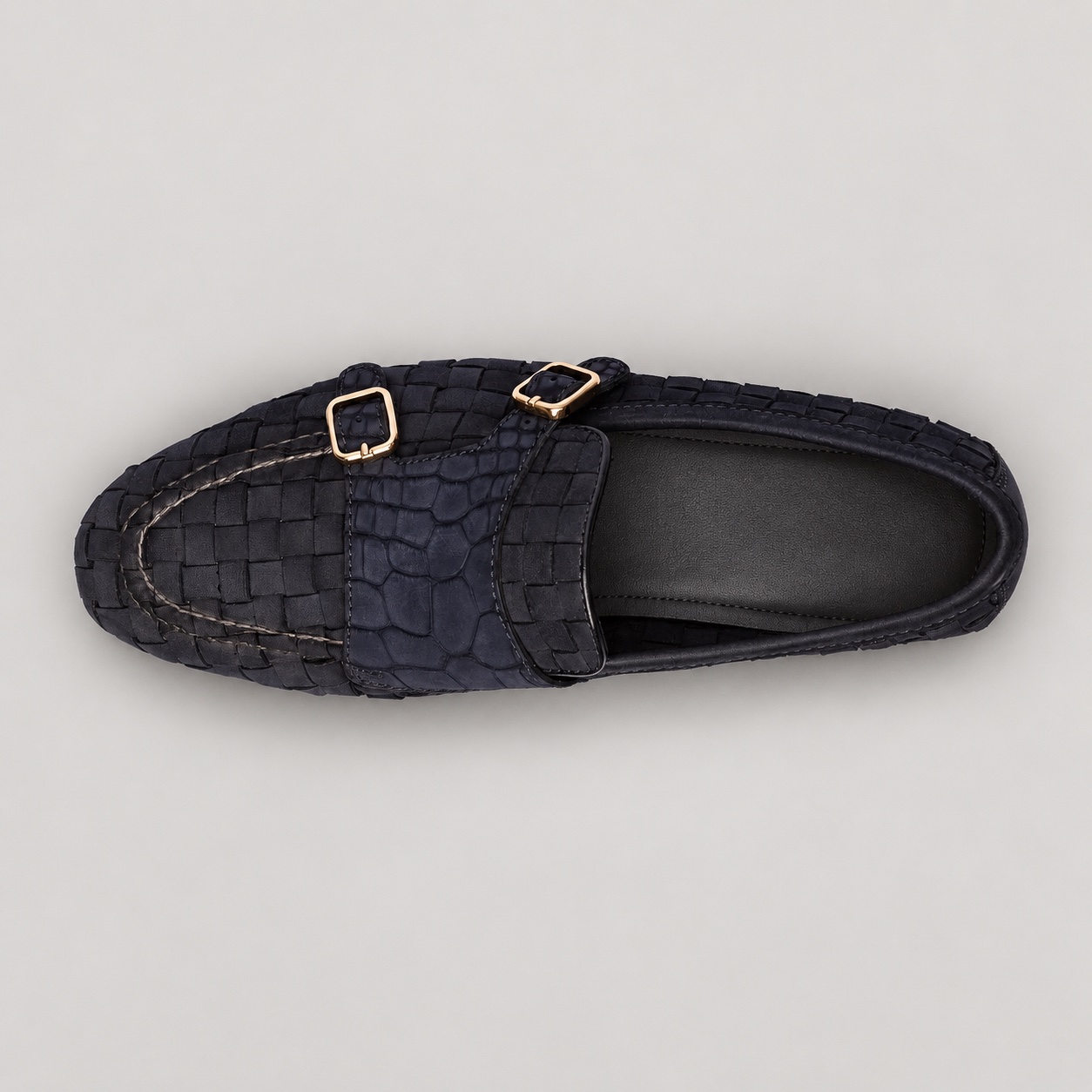 Top view of the double-buckle loafer with plain dark cowhide lining